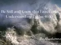 A powerful wave crashes against rocks, with text overlay: "Be Still and Know that I am God. Understanding Psalm 46:10.