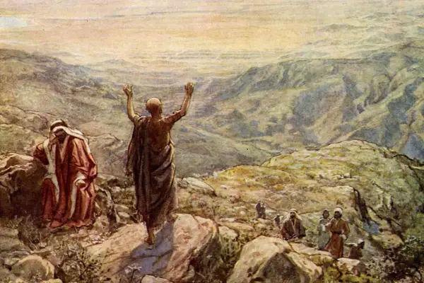 Balaam in the Bible, with arms raised, blesses Israel from a mountaintop. Another man in red looks on.